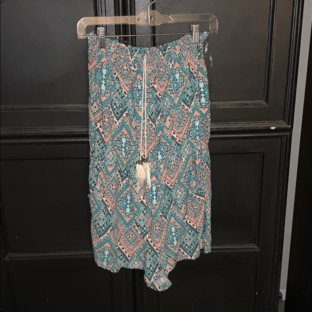 Pink and blue geometric romper
